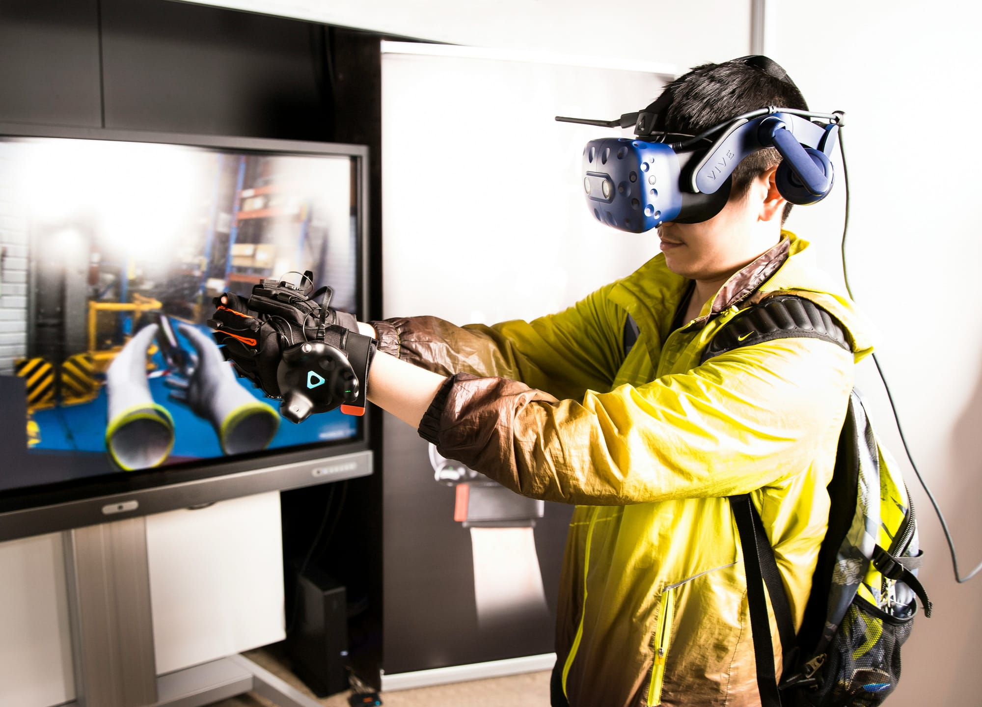 man in a jump suit getting VR Training