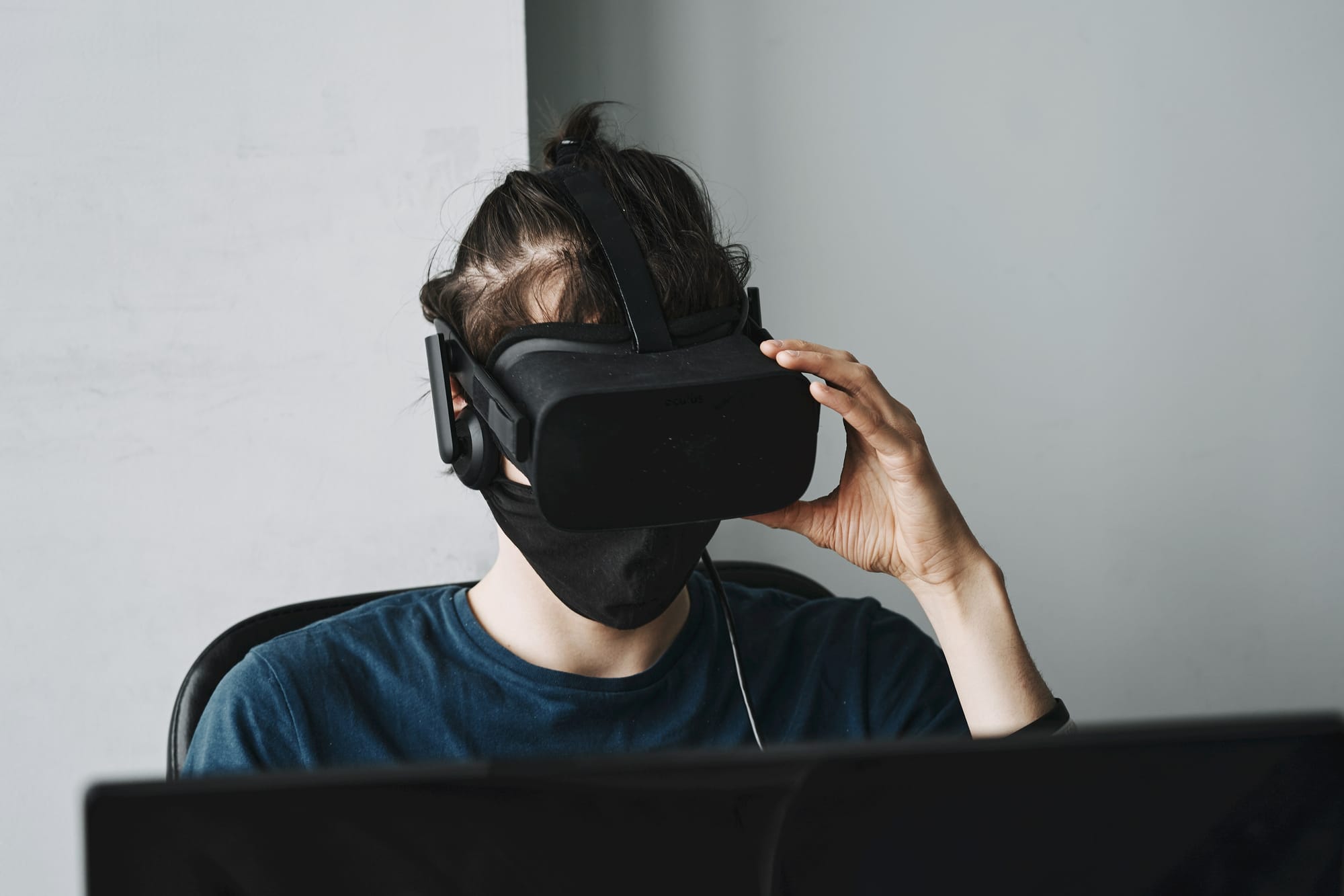 masked man using latest feature of VR Conferencing