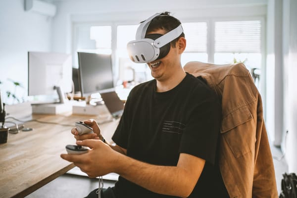 person sitting in his desk using Oculus For Work