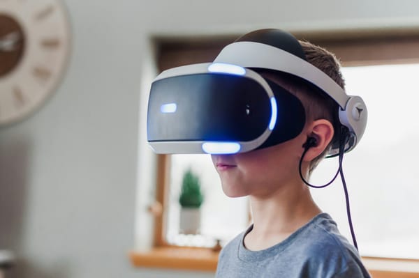 kid wearing a vr set for VR Programs