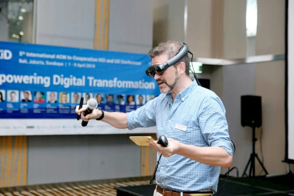 man showcasing power of Virtual Reality Business Applications